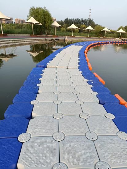 Floating Walkway with Colorful Pontoon Cubes image 6