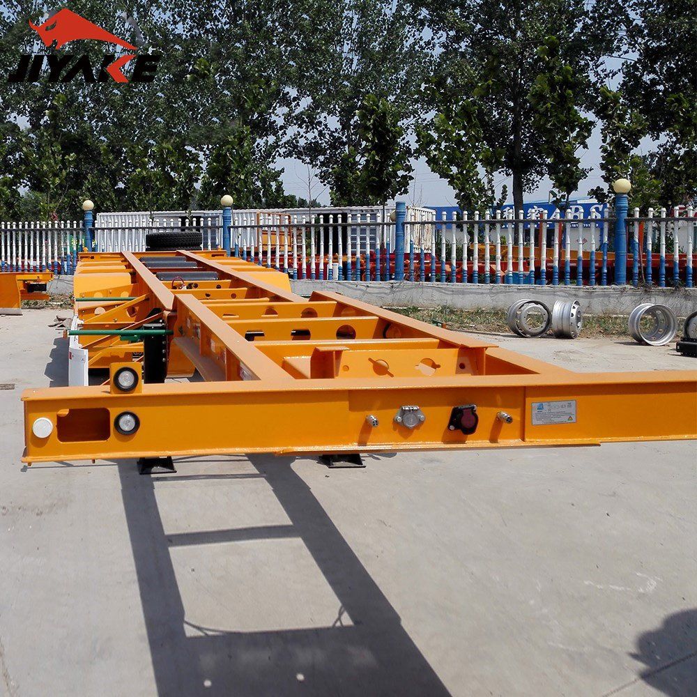 Jiyake 2/3/4 Axle 40t/60t New/Used Skeleton Truck Semi Trailer with Twist Lock to Sale