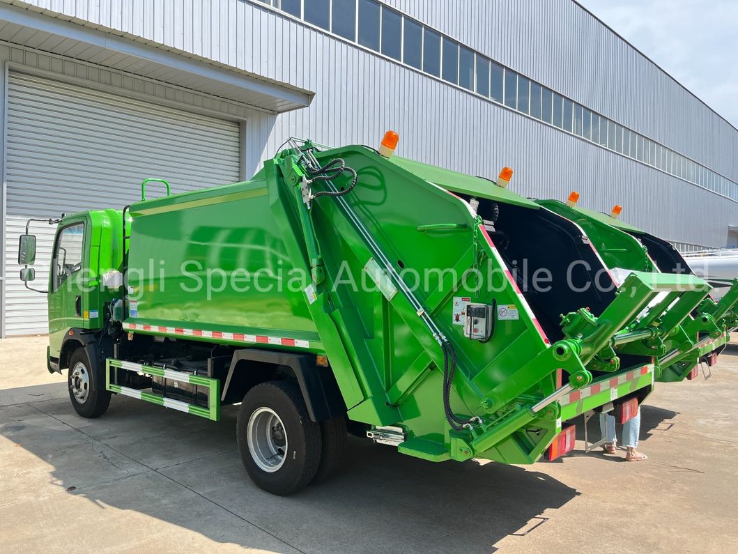 Hot Sale Sinotruk HOWO 6 Wheels Waste Collection Truck 5cbm 5m3 5tons Compressed Garbage Truck with Rear Bucket