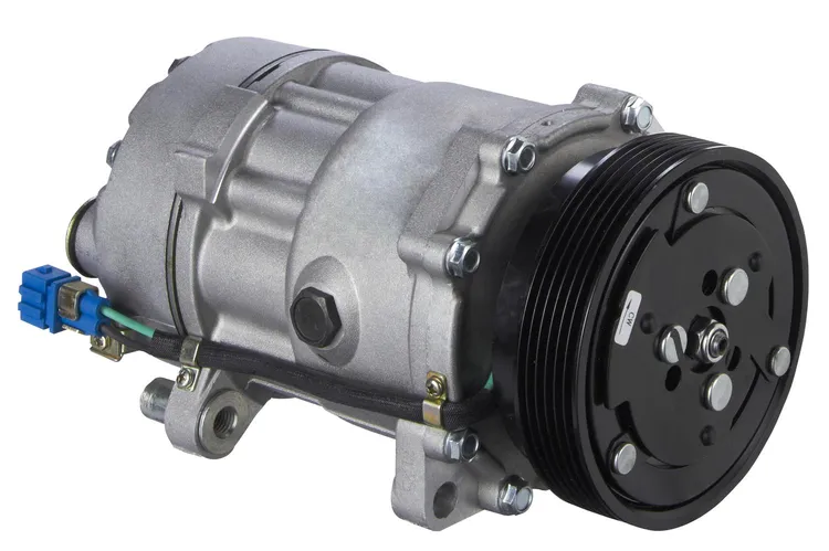 A close-up of a car compressorDescription automatically generated